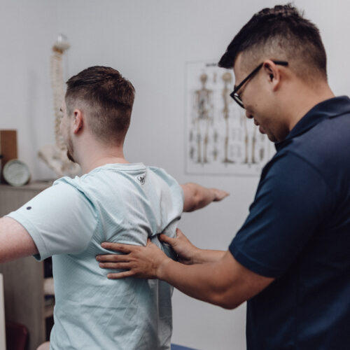 Chiropractor with patient at our Penrith clinic