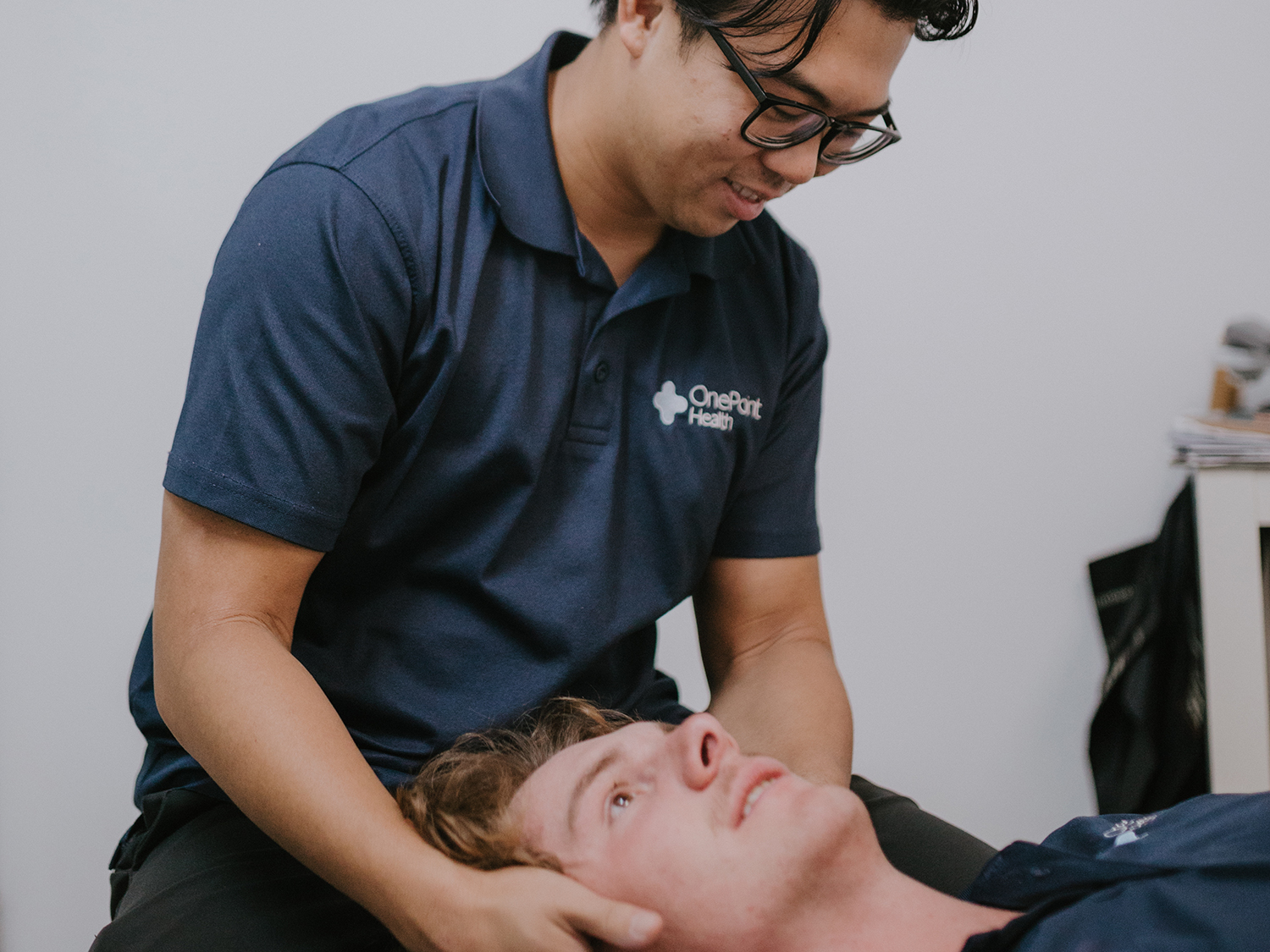 chiropractor treating for neck pain
